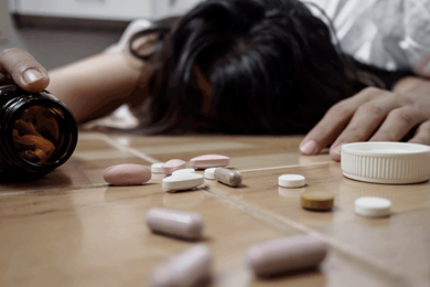 Opioid education female collapsed with scattered pills opioid education female collapsed with scattered pills